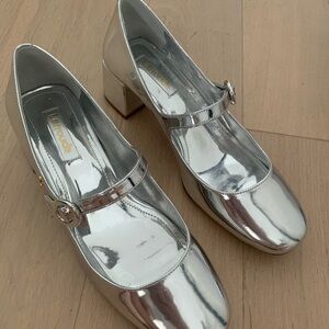 Larroude Blair block heels in Mirror Silver